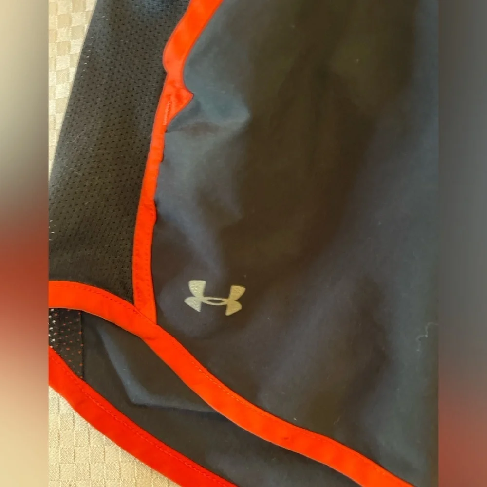 Under Armor black w/orange trip lined 3” inseam women’s running shorts. Size S. - Picture 3 of 7
